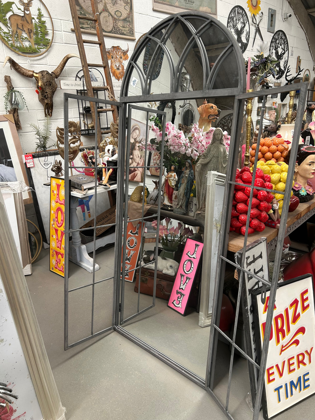Grey metal outdoor mirror - Large antiqued arch design with opening doors | Sign of the times Stoke