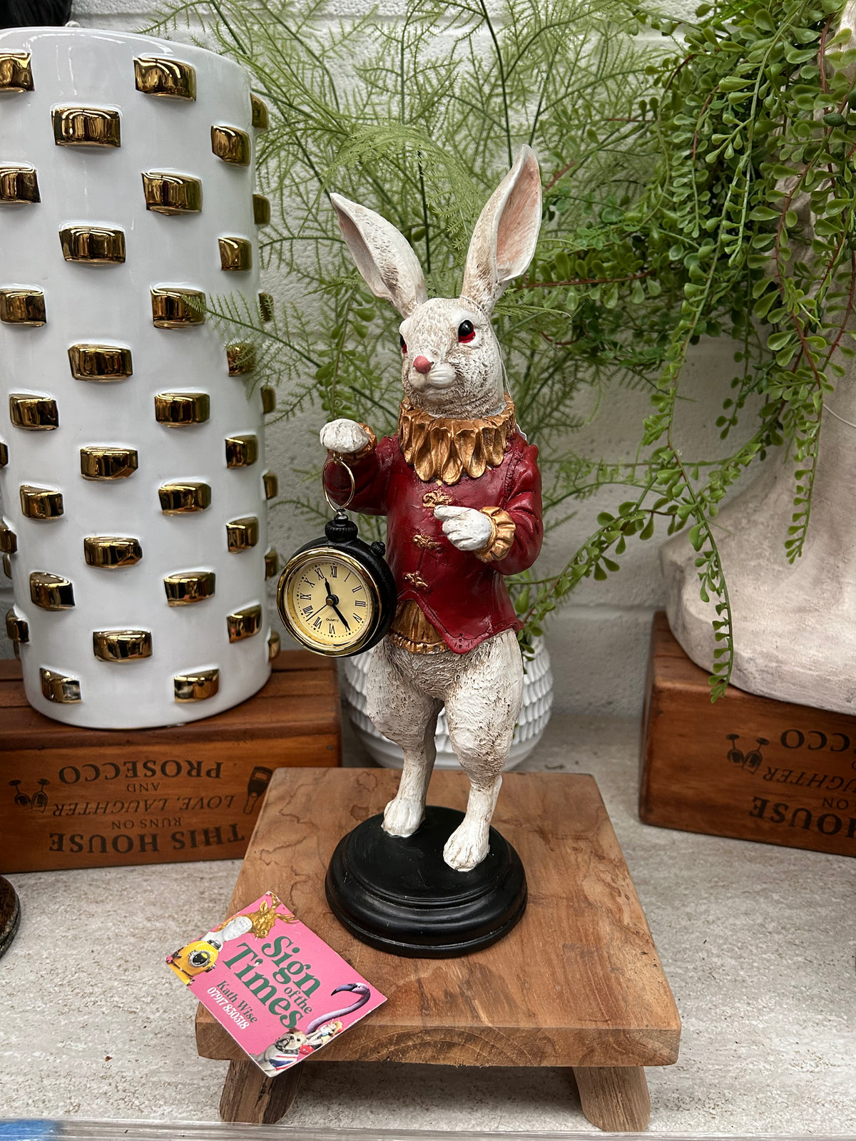 The White Standing Clock Figure with Red Jacket | Sign of the times Stoke